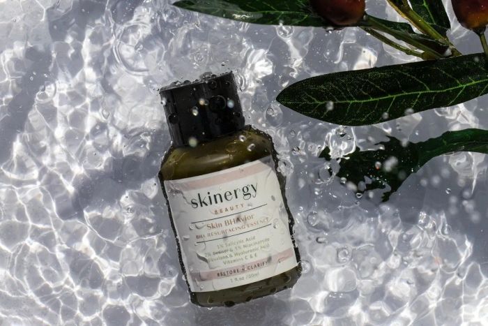 The bottle of Skin BHavior Resurfacing Essence, featuring its sleek and minimalistic design.