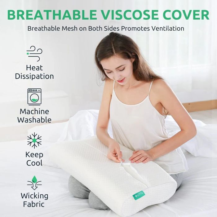 A person in a white tank top sits on a bed, zipping a pillow cover with text highlighting its breathable fabric and machine-washable design.