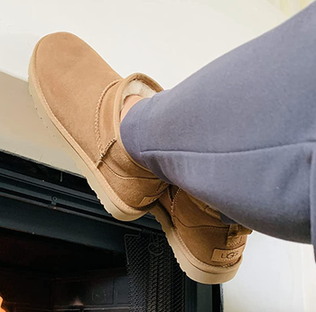 Reviewer wearing camel-colored booties