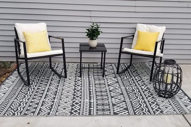 The reviewer's three-piece set is displayed in an outdoor setting