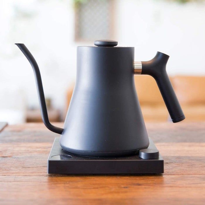 The matte black kettle paired with a matching base
