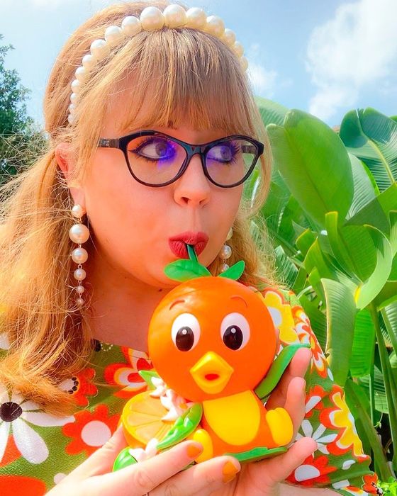 a reviewer sporting pearl drop earrings