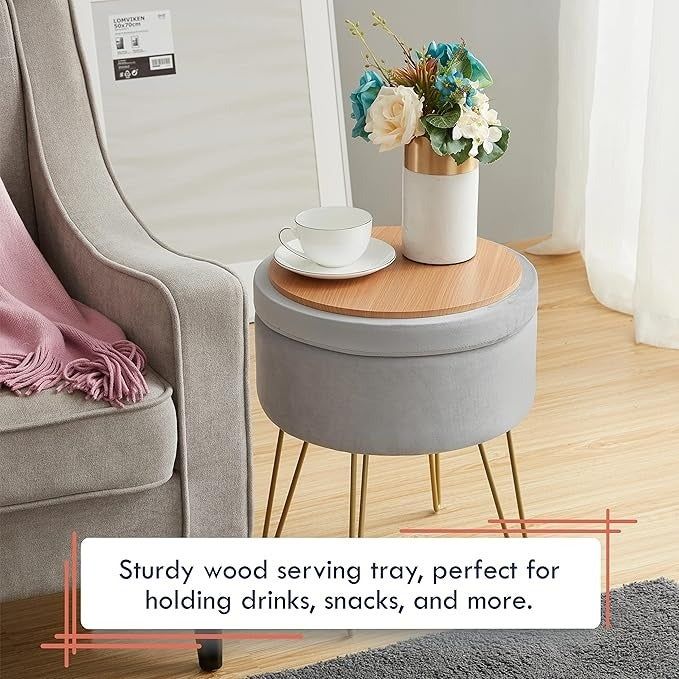 A round side table featuring a wooden top and metal legs, holding a vase of flowers and a cup. The caption highlights its versatility as a serving tray.
