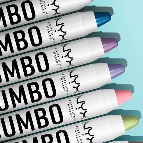 A close-up view of five different colored eyeshadow sticks neatly arranged next to each other