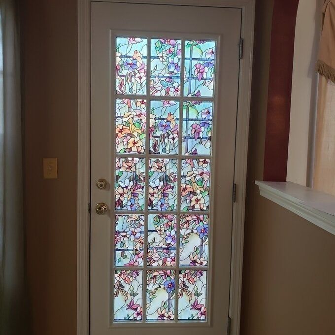 Reviewer photo of the floral window film applied to a door