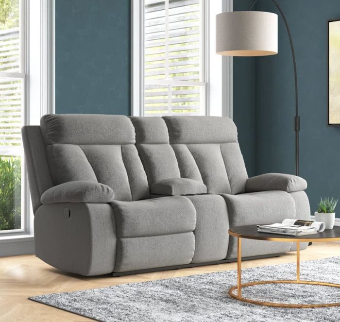 Two soft, grey, and comfortable reclining lazy boys perfect for lounging and relaxing