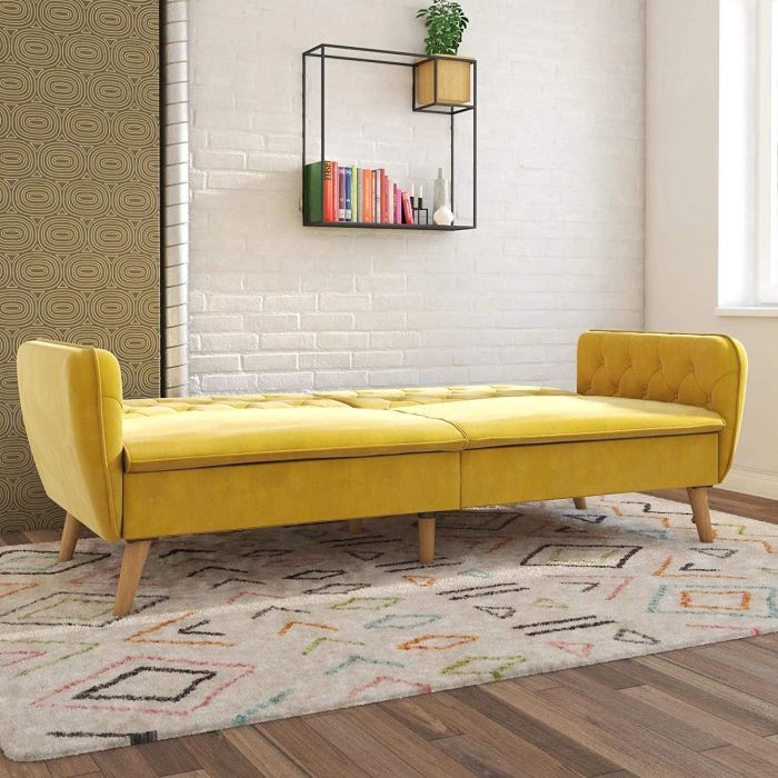 The yellow futon unfolded into a mattress.
