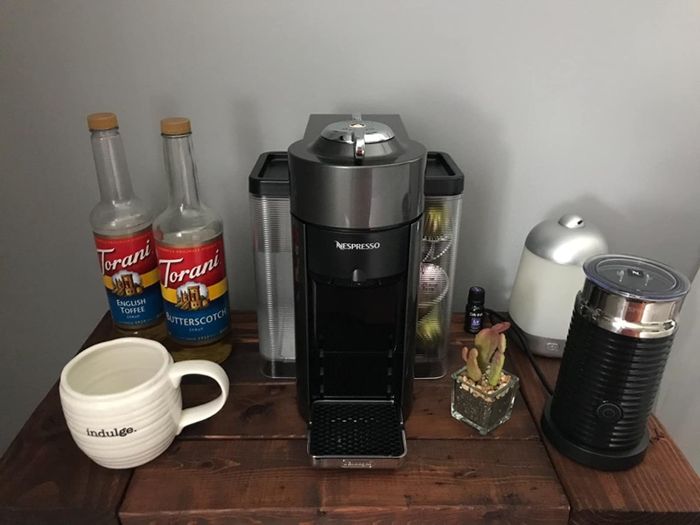 A coffee station set up by a reviewer featuring the Nespresso machine.