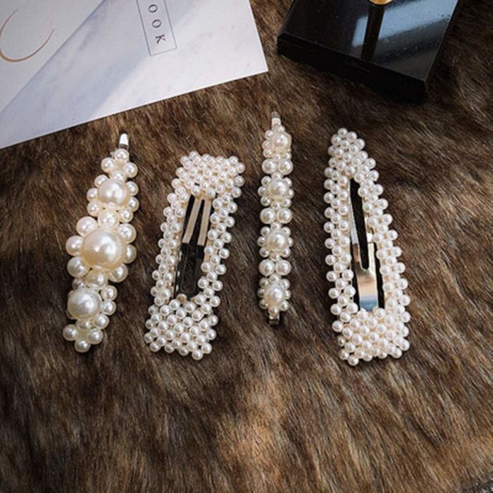 The collection of four beautiful pearl clips.