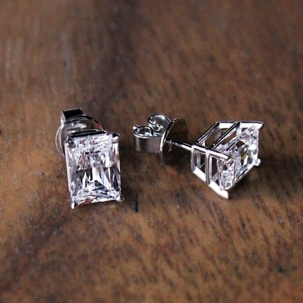 A pair of radiant cut diamond alternative stud earrings.
