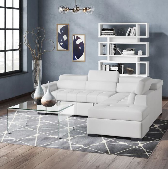 large white sectional couch with integrated storage compartments for easy organization