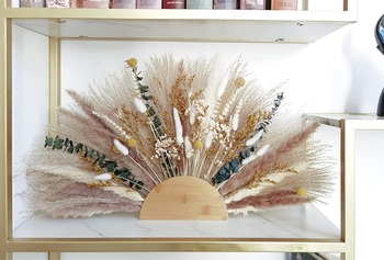 Reviewer's half wreath decorated with pampas grass and dried flowers