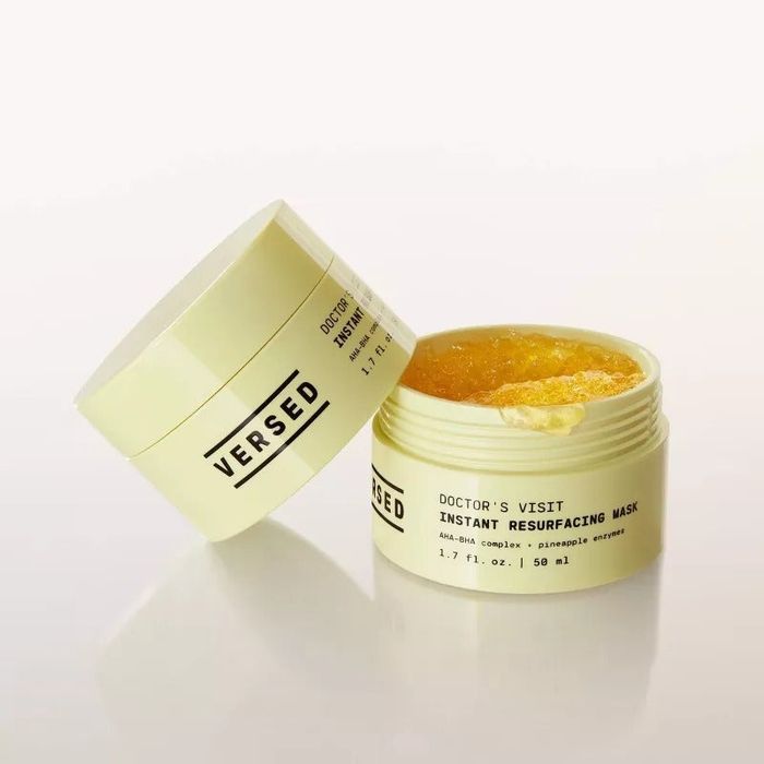 An open jar of the mask showing its gel-like texture