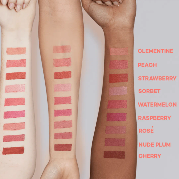 Three arms with different skin tones showcasing all nine shades of the Lid-to-Lip Balmy