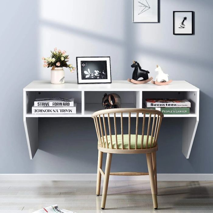 White wall-mounted desk with handy storage cubbies