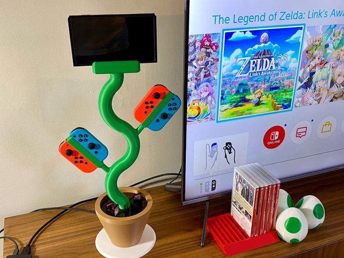 A Nintendo Switch charging station designed like a plant, combining functionality and style.