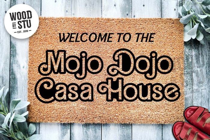 the doormat with the message that reads