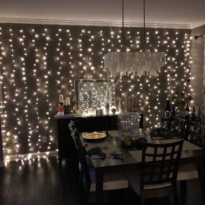 A reviewer's dining room featuring white fairy lights delicately hung on the wall