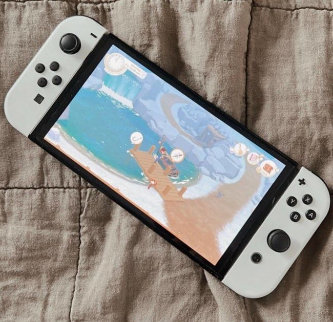 An editor's white Nintendo Switch OLED