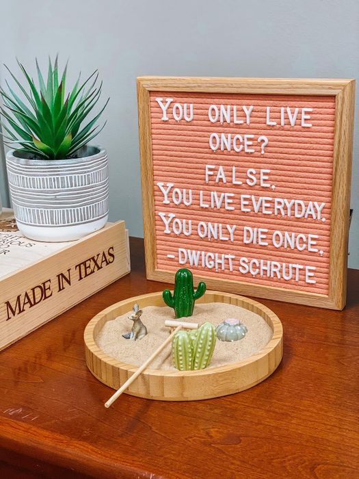 reviewers pink letter board featuring a quote from The Office
