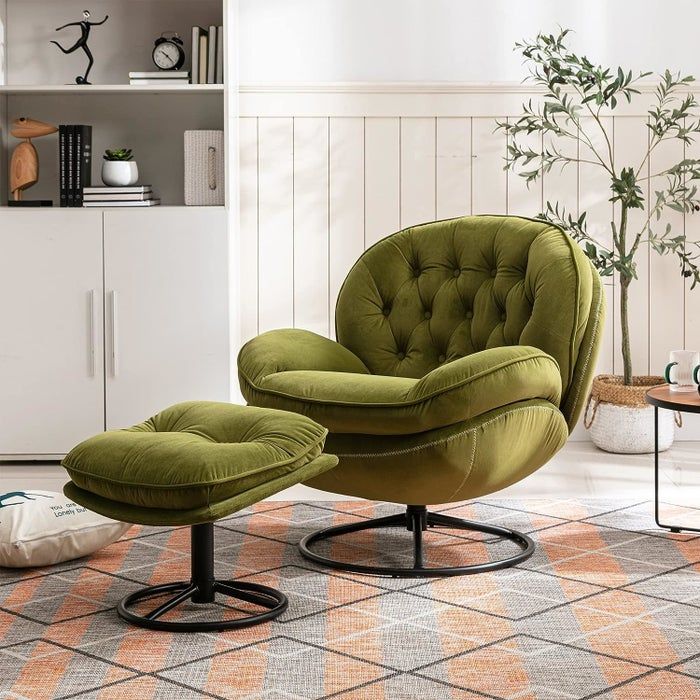 A luxurious green swivel chair with a matching ottoman, set in a cozy room environment