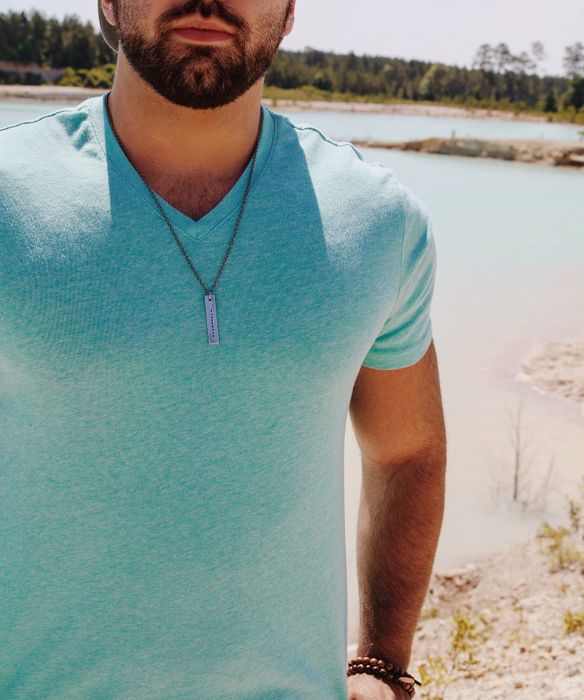 A person wearing a necklace