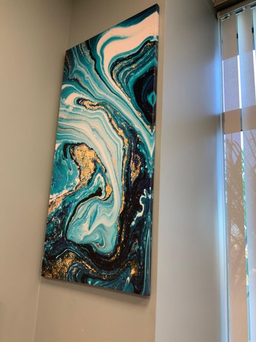 reviewer's blue, white, and gold abstract marble painting