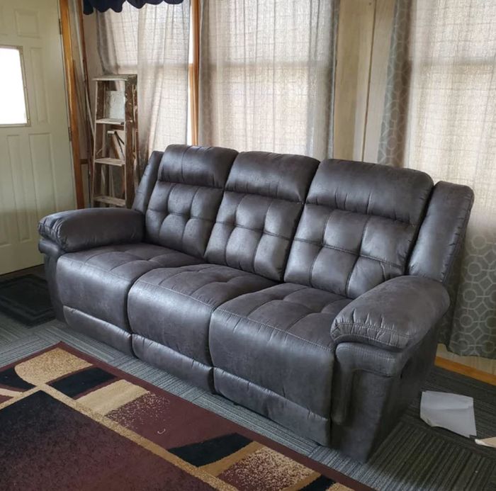 tufted dark silver recliner, adding a touch of elegance to any room