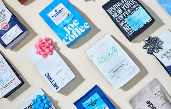 A collection of coffee bags adorned with bows.