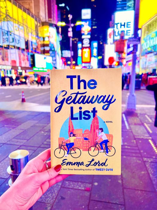 A photo of The Getaway List book in Times Square