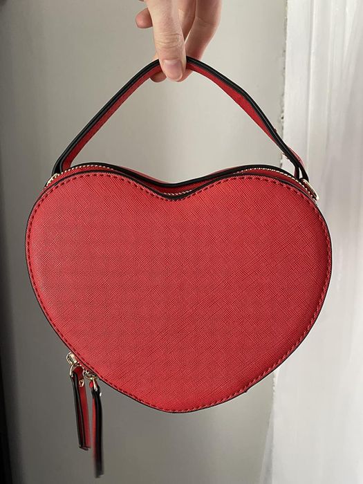 A red heart-shaped bag.