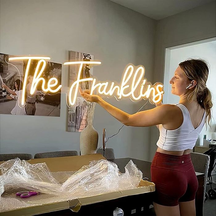 model displaying an LED neon sign that reads