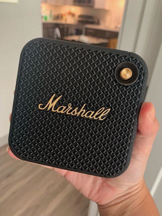 Writer of the article holding the Marshall speaker in their hand