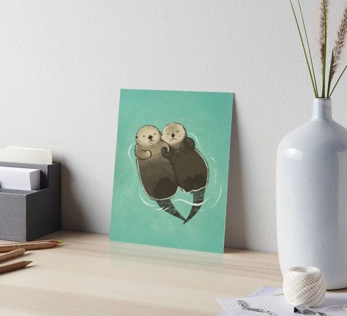 The art print displayed on a desk
