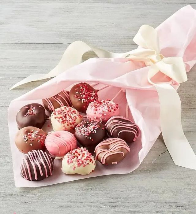 The donut bouquet tied up with a white bow.