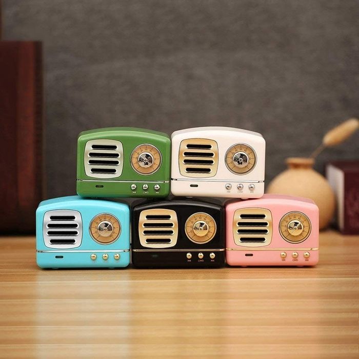 Mini retro-style radio speakers in blue, white, black, green, and pink