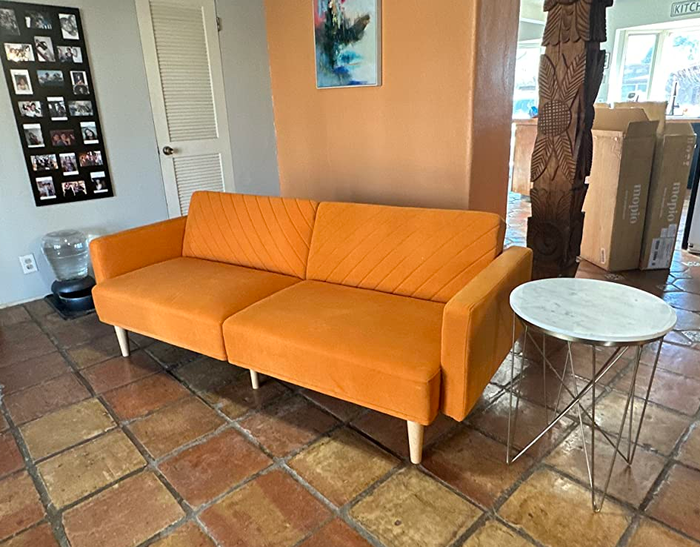 reviewer's stylish orange chevron futon