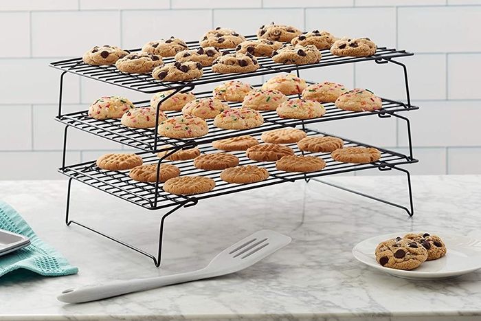 freshly baked cookies resting on a cooling rack
