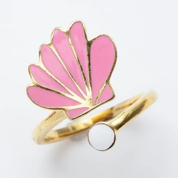 A beautiful pink seashell and pearl ring.