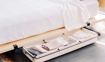 Under-bed storage drawers on the Floyd platform bed