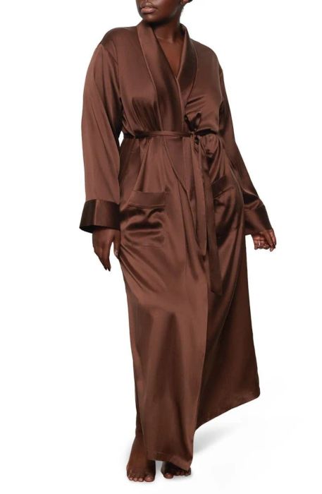 Model wearing a luxurious cocoa-colored silk robe.