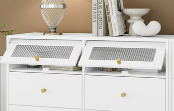The two compartments of the dresser opened to reveal the hidden storage inside