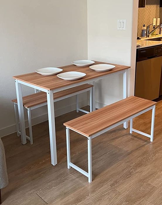 reviewer's table with white legs and wood top
