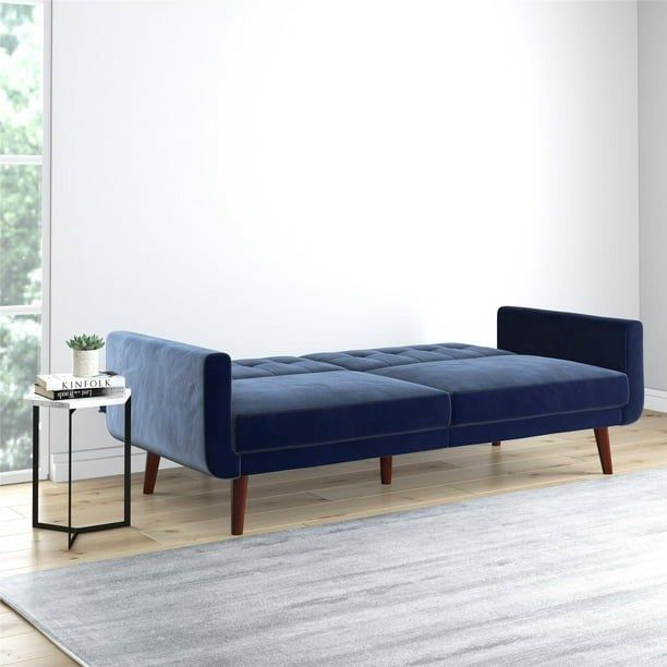 Blue velvet futon in its flat position