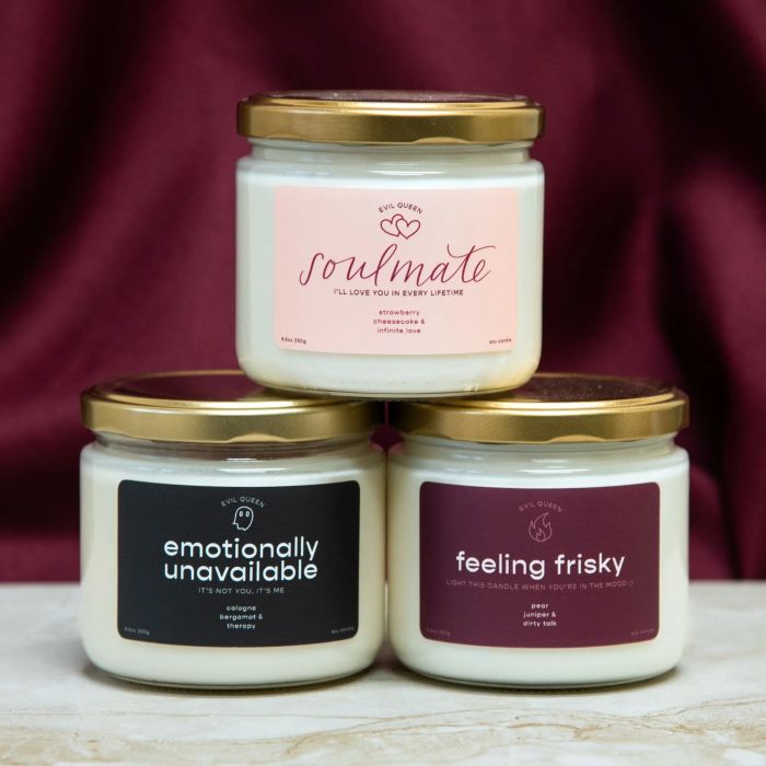 A trio of Valentine's Day-themed candles stacked together
