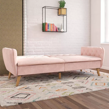 the pink futon laid flat
