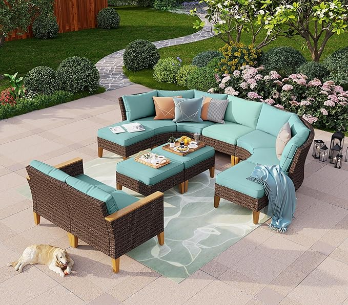 Blue outdoor sectional set including a half-moon sofa, two armless chairs, two ottomans, and a table