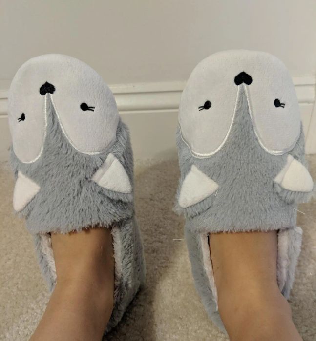 A close-up of the slippers worn by a customer.