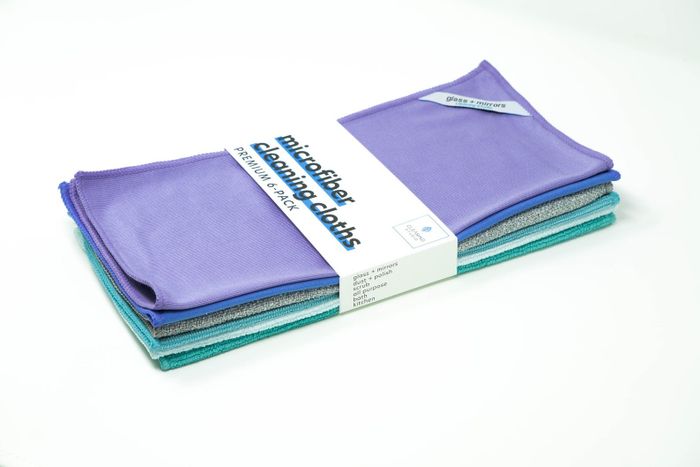 A stack of six microfiber cloths, each in a different color