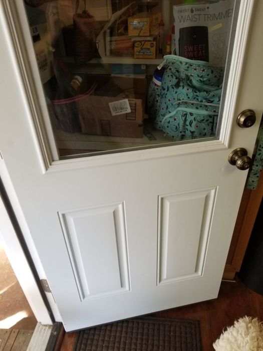 The after shot showing the door gleaming clean.
